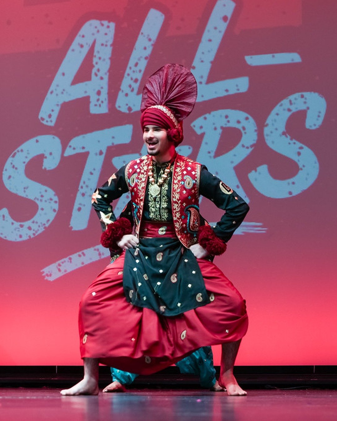 All-Stars and Royal Stars dancer in ceremonial academy outfit