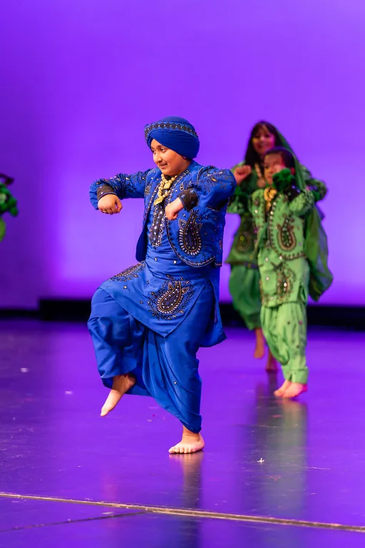 Bhangra Empire dancers performing on stage